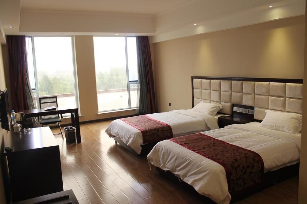 Weishi International Hotel Qing Zhou 외부 사진